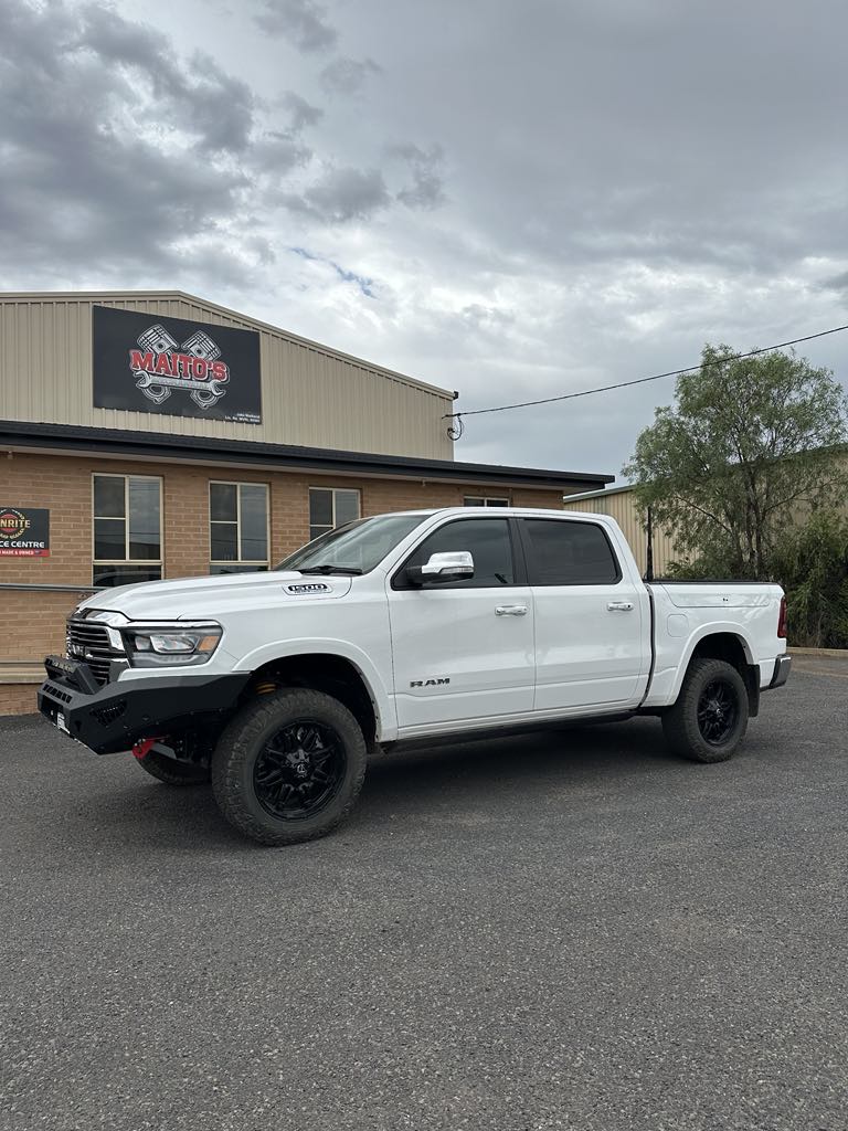 A white RAM 1500 Laramie parked outside the Maito’s Mechanical workshop in Parkes